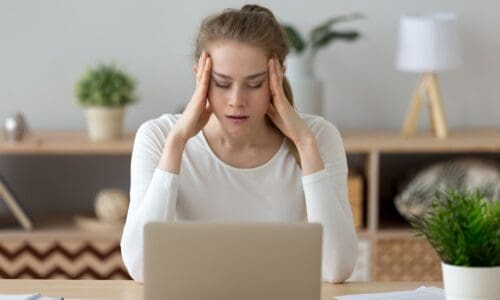 woman overwhelmed with work tasks