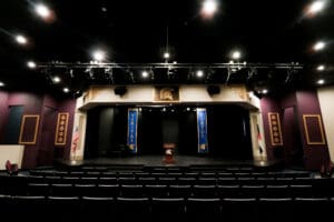 Dimly lit school auditorium