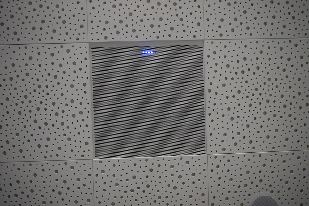 Speaker installed into a classroom ceiling