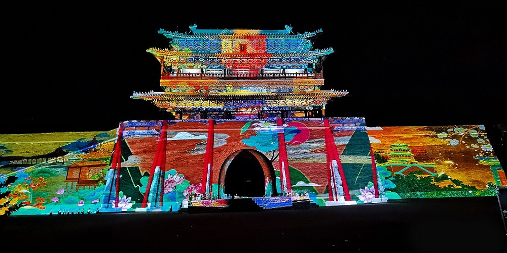 Projection of colorful palace in China at night.