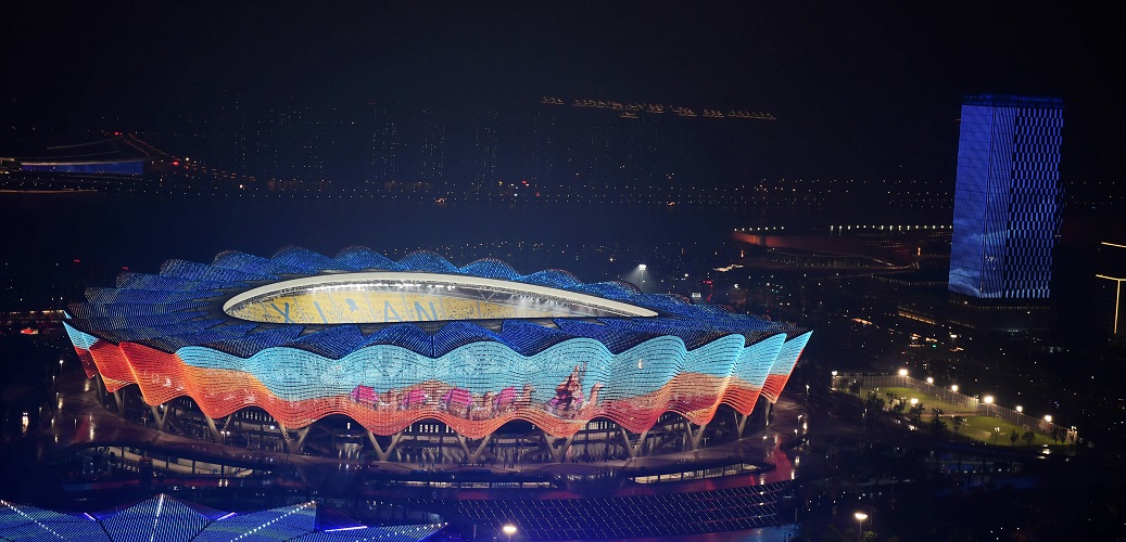 View of the Olympic Sports Center lit up at night