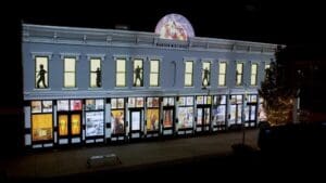 Building with projection displayed on the windows