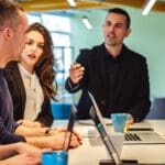 Vendors interacting in an office.