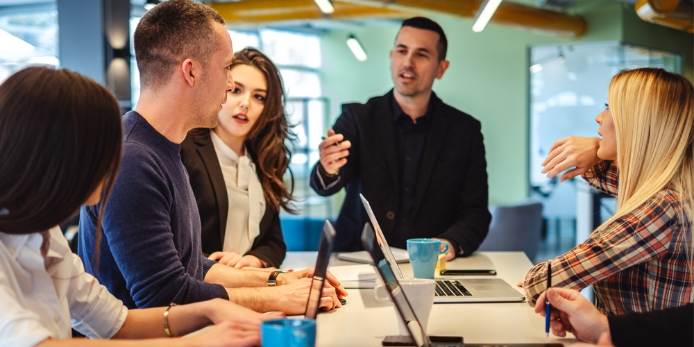 Vendors interacting in an office.
