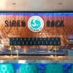 Taproom that says "Siren Rock"