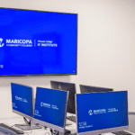 Extron screens displaying the words: Maricopa Community Colleges | Phoenix College IT Institute