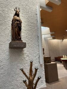 Renkus-Heinz speaker next to a statue on a wall of St. Katharina church.