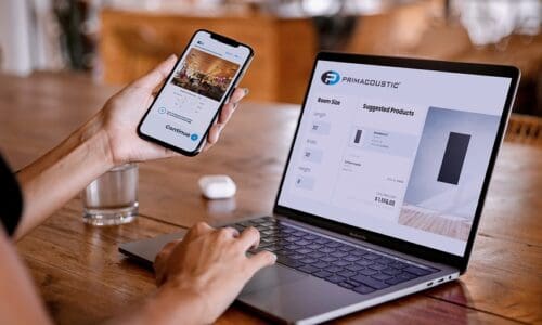 Person using Primacoustic's PrimaPro app on the phone as well as on a desktop.