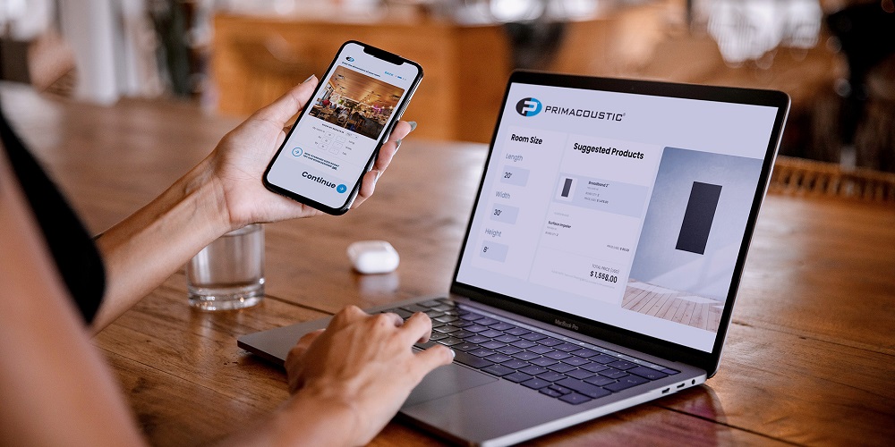 Person using Primacoustic's PrimaPro app on the phone as well as on a desktop.