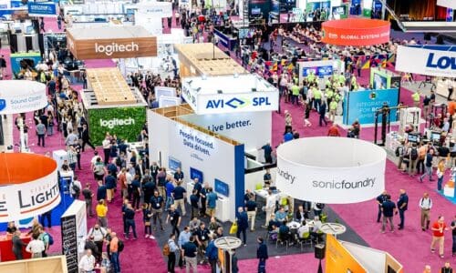 The InfoComm 2022 exhibit floor, packed with people.