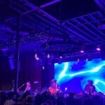 Band performing onstage at Goldfield with a Visionary PacketAV network.