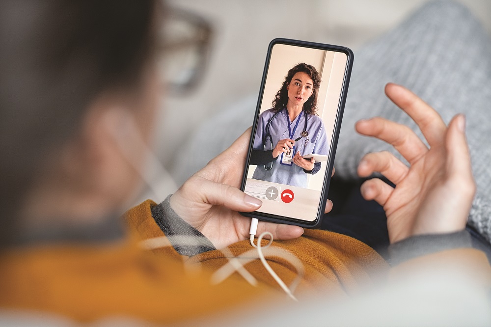 Person using telehealth services.