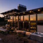 A modern home at night.