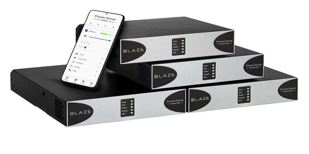 Phone with V1.2 update on the screen sitting on top of Blaze Audio PowerZone Connect amplifiers.