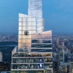 Summit One Vanderbilt building reflecting the morning sky.
