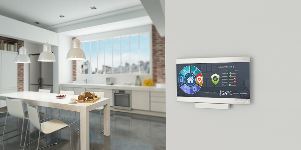 Interior of a smart home with a security system on the wall.