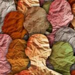 Poster of paper silhouettes symbolizing gender diversity.