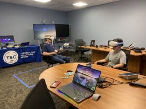 People outfitting a room in VR