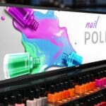 Mockup of PPDS Philips S-Line in a drugstore showing a nail polish ad.