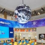 Planar LED ribbon displaying Thunderbird School welcome message in Digital Forum.