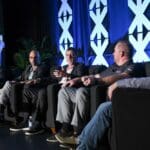 Dan Ferrisi and a group of expert panelists at Total Tech Summit 2022 last month.