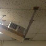 A projector hanging from the ceiling at an awkward angle: A perfect example of an #avfail.