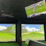 LG Projectors displaying a golf simulation onscreen at WJ Golf.