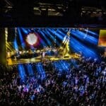 Hard Rock Live venue packed with audience dancing to performers onstage.