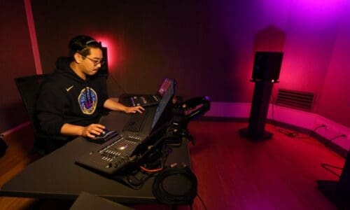 Person inside production studio at HIT Productions.