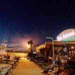 View of Captain Anderson's restaurant at night.