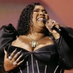 Lizzo performing at GRAMMYs.