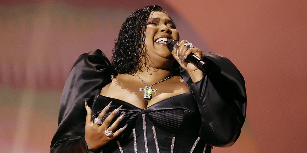 Lizzo performing at GRAMMYs.