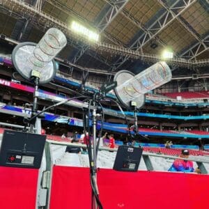 Shure antenna on football field.