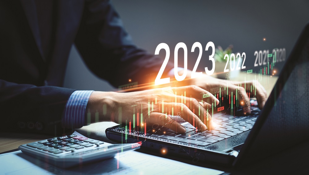 market trends for 2023, Businessman calculating financial data for long term investments. Analytical businessman planning business growth 2023 with future economic growth arrow