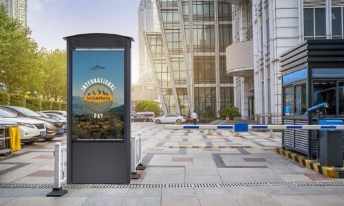 Peerless-AV smart city kiosk placed in front of a bus stand.