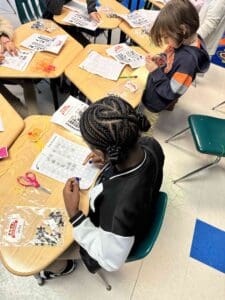 Children working on binary coding kits.