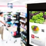 A digital signage kiosk at a supermarket.