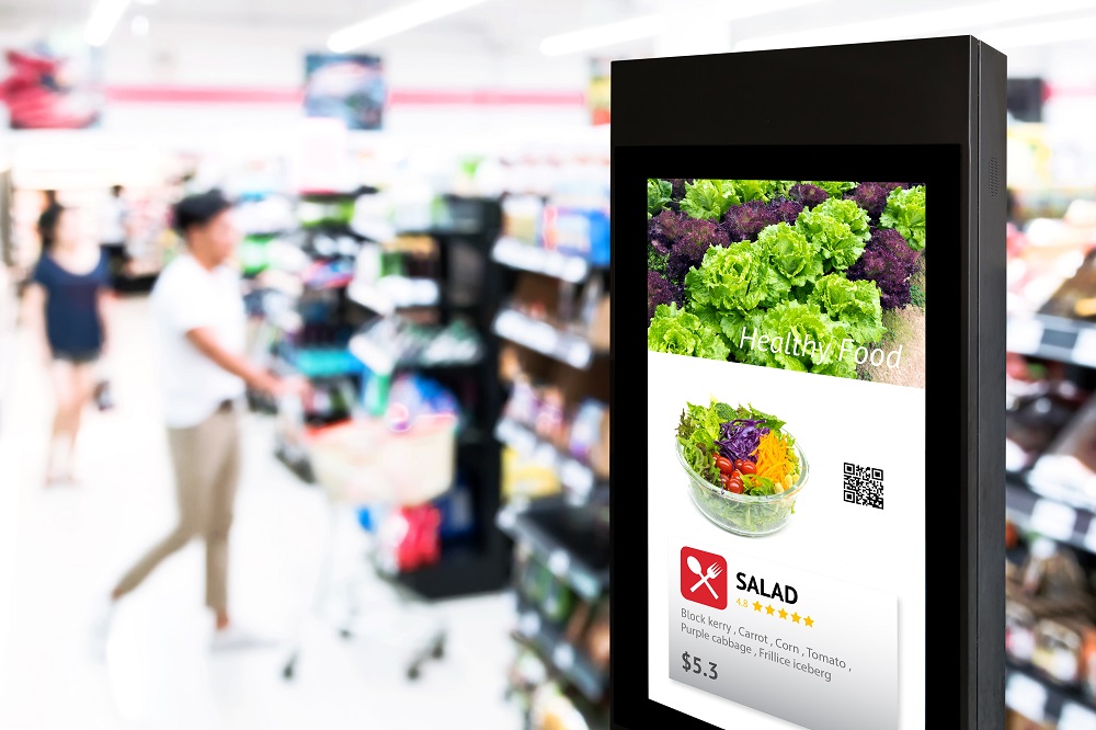 A digital signage kiosk at a supermarket.