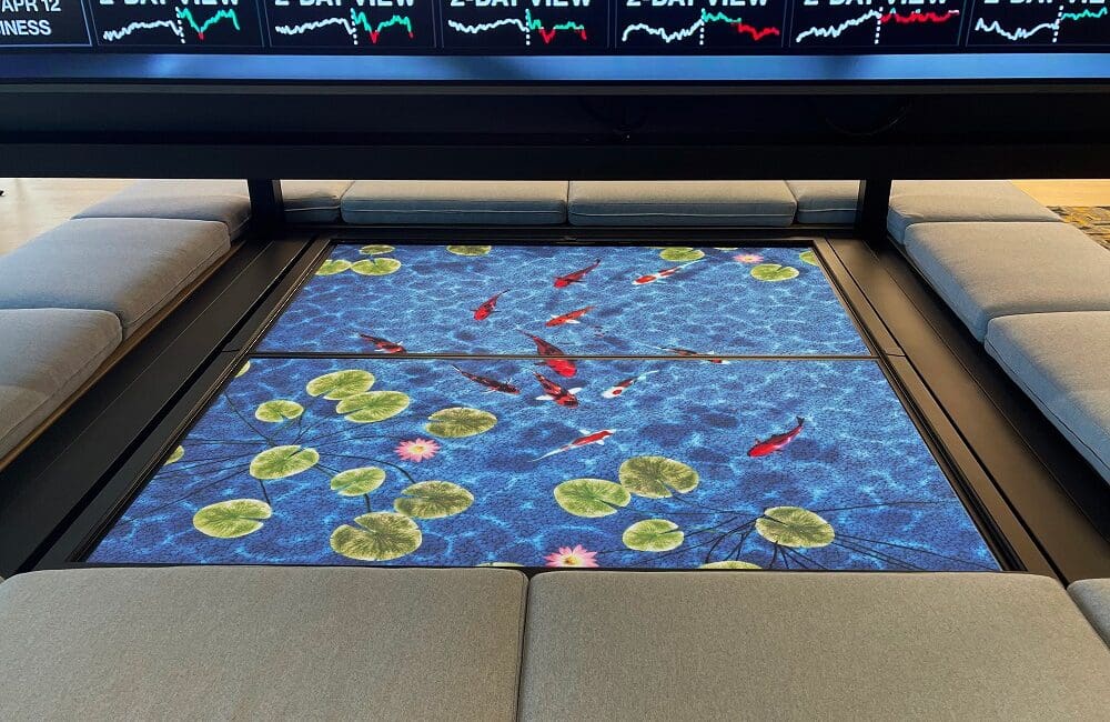 Red Dot Digital Media Deploys Interactive Koi Pond at Major Bank’s HQ, slide 0