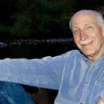 Bill Apter relaxing against a tree.