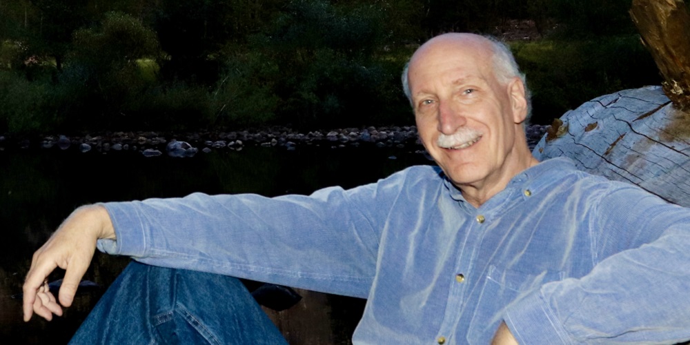 Bill Apter relaxing against a tree.