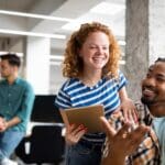 People interacting in the workplace.