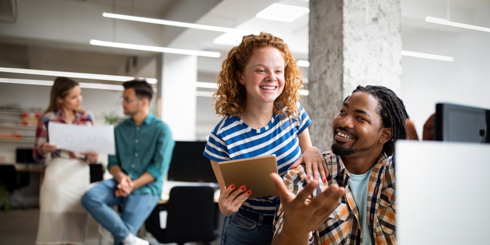 People interacting in the workplace.