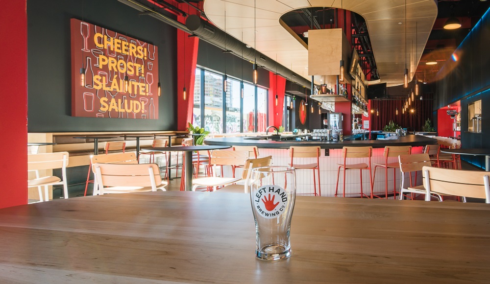 Left Hand Brewing cup on table inside the bar.