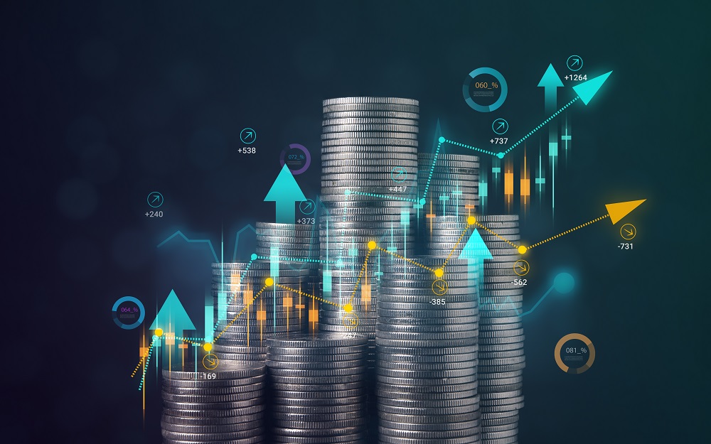 Stack of coins with graph chart growth up.