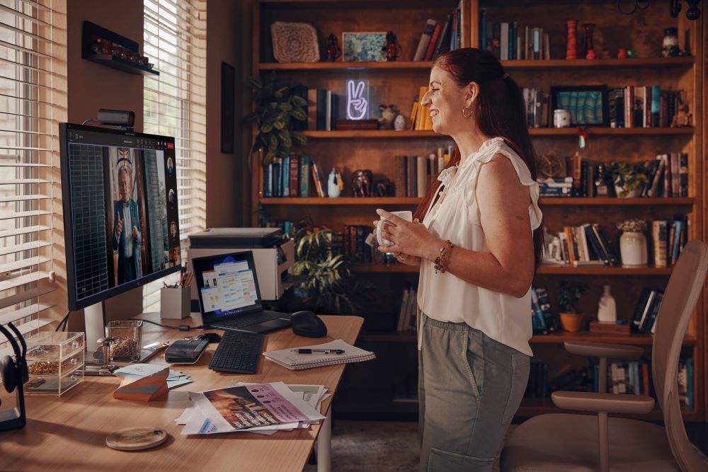 Person at work using HP collaboration devices.