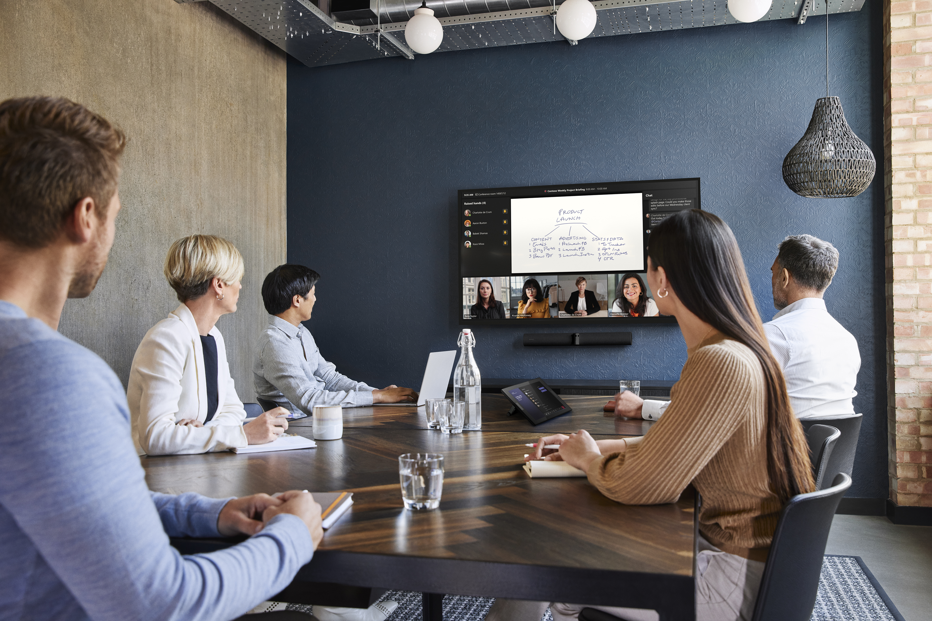 People using Jabra videobar with Microsoft Intelligent Speaker feature.