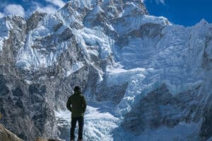 hiker fulfilling goal in the mountain