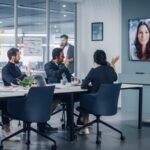 People in conference rooms using Zoom.