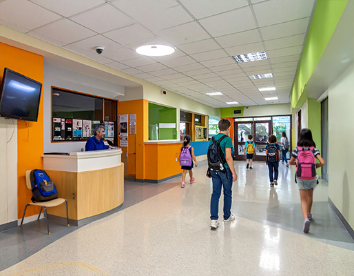 Firefly colorful indoor school main entrance with realistic young students with backpacks walking ar